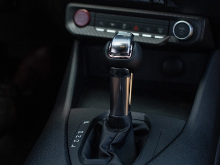 Close-up of the gear selector, highlighting the available automatic transmission.
