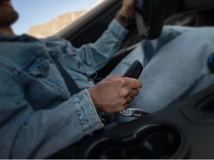 Close up of driver operating the drift brake in action.